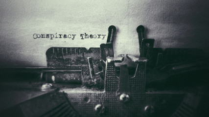 Conspiracy Theory text typed on paper with old typewriter in vintage background - obrazy, fototapety, plakaty