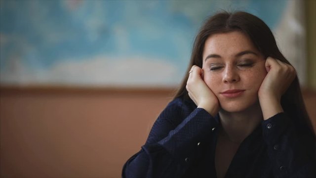 sad or bored student girl in classrom, education, university