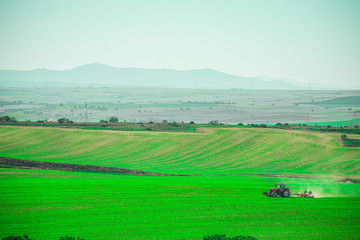 Green Field With Tractor
