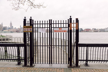 April 20 2020 - Hoboken NJ: local park is closed due to the COVID-19 Coronavirus outbreak. The parks are closed to increase social distancing and prevent people from congregating