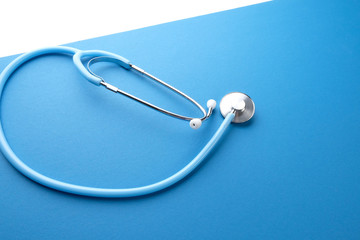 Stethoscope on a blue background.