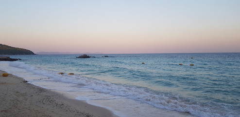 Visit Thailand on your vocation. Discover supernatural islands landscapes in morning or evening.Catch sunrise or sunset with  mountains rocks and sea waves with foam