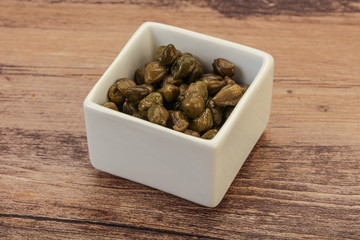Tasty capers in the bowl