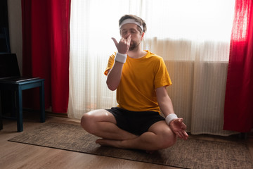 man making Alternate Nostril Breathing exercise, nadi shodhana pranayama