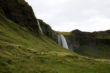 Fototapeta na wymiar Seljalandsfoss / Iceland - August 15, 2017: Seljalandsfoss one of the most famous Icelandic waterfall, Iceland, Europe