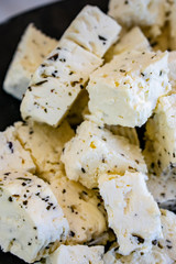 Feta cheese on black plate, Johannesburg, South Africa