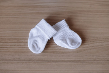 Beautiful baby clothes. Newborn baby booties 