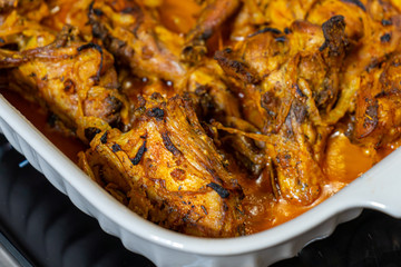 Rabbit prepared in own with onions