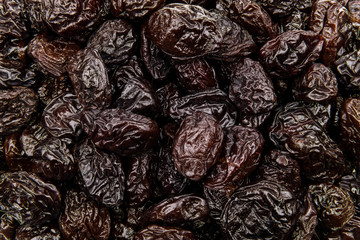 Background of dried plums and prunes, texture