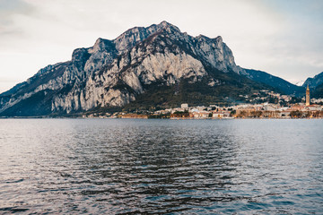 beautiful city on  background of blue mountains and blue lake como