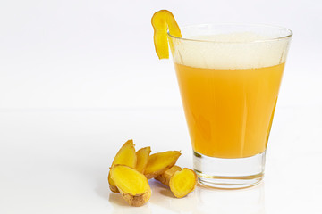 Fresh homemade ginger beer cocktail. Ice and lime on the table. On white background. Copy space.