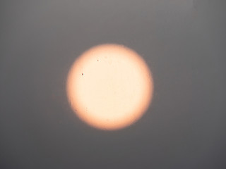 Blurred image of the sun at sunset.