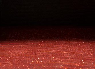 The animated red sparkling background scene with the black backdrop