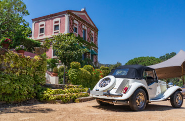 Classic white car, ready for a wedding