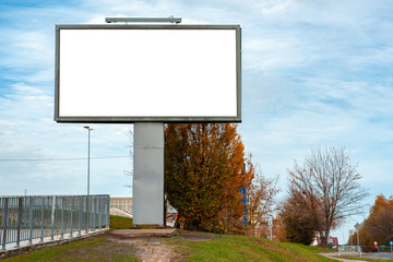 Blank white advertising billboard in the city - obrazy, fototapety, plakaty