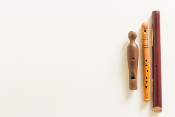 Series of wooden wind musical instruments. Isolated on white background