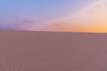Obraz na płótnie Canvas Sunset over the sand dunes, Canary Island of Fuerteventura