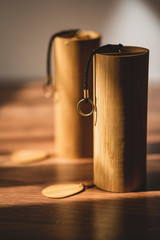 Hand made Koshi chimes musical instruments made from bamboo in beautiful and dramatic sunlight....