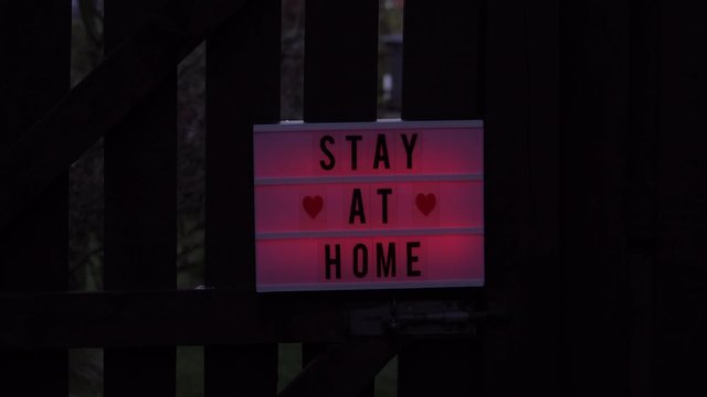 Message on a lightbox relating to the coronavirus pandemic. 