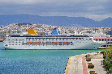 Classic  cruiseships or cruise ship liners Costa NeoRiviera and Tui Discovery in port of Athens,...