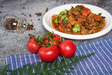 Goulash, beef stew in cast iron pan, top view, close up