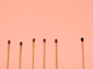 Social distancing is an important infection control action to stop or slow the spread of COVID-19 coronavirus. represented by matches, Stay at home