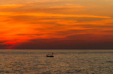 Sunset and fishing boat in Turkey