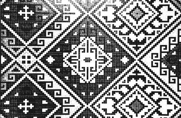 Distress grunge vector texture of fabric with geometric ornament. Black and white background.