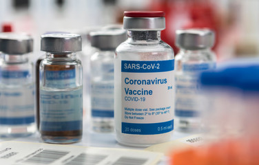 Coronavirus covid-19 experimental vaccine in a laboratory, conceptual image