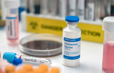 Coronavirus covid-19 experimental vaccine in a laboratory, conceptual image