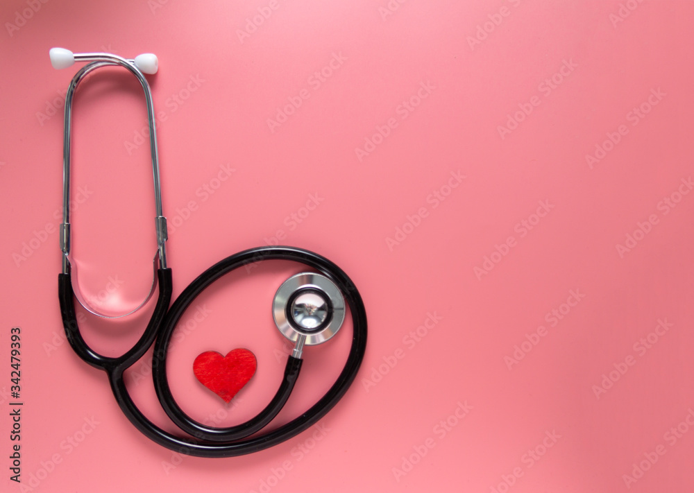 Wall mural international's nurse day, week concept, stethoscope and red heart on pink background with copy spac