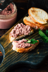 Delicious homemade liver pate on a slice of wheat toast