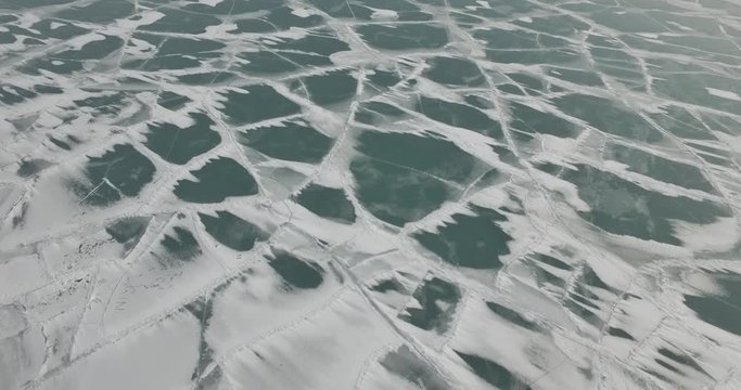 aerial drone over a frozen lake