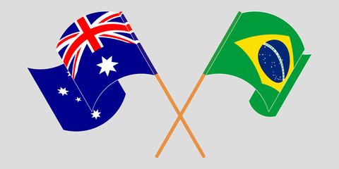 Crossed and waving flags of Australia and Brazil