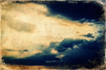 Sunset clouds with blue sky, sky cloud background, old photo effect.