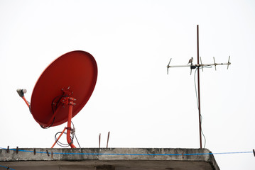 Antenna on house roof in Guatemala, Latin America, obsolete technology, analog TV, communication...