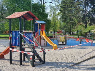 All slides in playground are sealed off with tape to prevent kids from playing