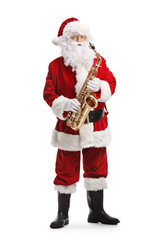 Santa Claus standing and holding a saxophone