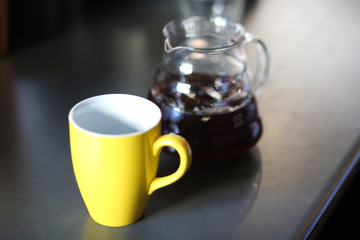 cup of coffee and teapot

