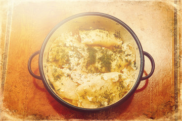 pies and dill in a casserole, old photo effect.