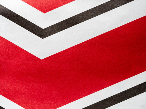 red white and black v shaped pattern