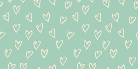 Seamless heart hand drawn pattern in vector illustration. Mint and yellow pastel colors cute simple design for scrapbooking wallpaper textile craft paper. Muted illustration colors for aesthetic.