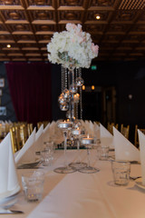 wedding cake with candles and flowers and sweet