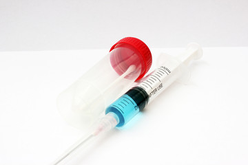 Syringe near biological sample test