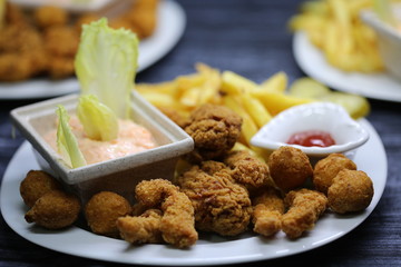 Delicious chicken meal with fries and mayonnaise