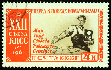 Soviet worker with Program of Communist Party