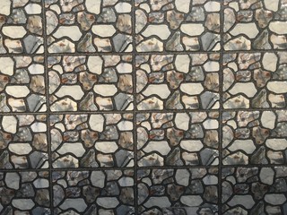 Compound wall tiles with printed design of small stones in random aggregates style for an...
