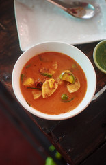 Cooking delicious traditional Thai red curry in cooking class. Chiang Mai Thailand