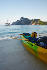Kayak on Monkey beach Phi phi island Thailand. Adventure sea Kayaking backpacking.