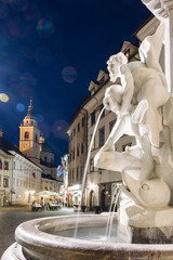 Details of Robba fountain on a summer night in Ljubljana city square